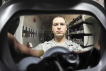 Senior Airman Jimmy VanHuss, 5th Medical Group bioenvironmental engineering flight technician, performs a gas mask fit test Nov. 12, 2009, at Minot Air Force Base, N.D.  (U.S. Air Force photo/Senior Airman Wesley Wright)