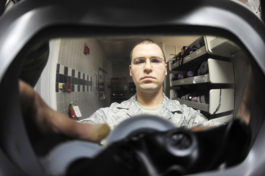 Senior Airman Jimmy VanHuss, 5th Medical Group bioenvironmental engineering flight technician, performs a gas mask fit test Nov. 12, 2009, at Minot Air Force Base, N.D.  (U.S. Air Force photo/Senior Airman Wesley Wright)