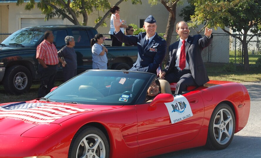 Col. Craig Wills, 47th Operations Group commander, and Efrain Valdez, Del Rio’s mayor, participate in the Veterans Day parade that went from Del Rio’s Star Park to the Del Rio Civic Center. Representing Laughlin in the parade was the Laughlin Honor Guard, a formation of marching Airmen, firefighters and Sparky the Fire Dog and members of the 47th Security Forces Squadron. At the Veterans Day ceremony, Capt. (Chaplain) Brian Nierman, wing chaplain, led a prayer that was followed by an 11-minute speech from Col. Wills. Robert Wade, 47th Flying Training Wing staff, sang the National Anthem and God Bless America. (U.S. Air Force photo by Joel Langton)