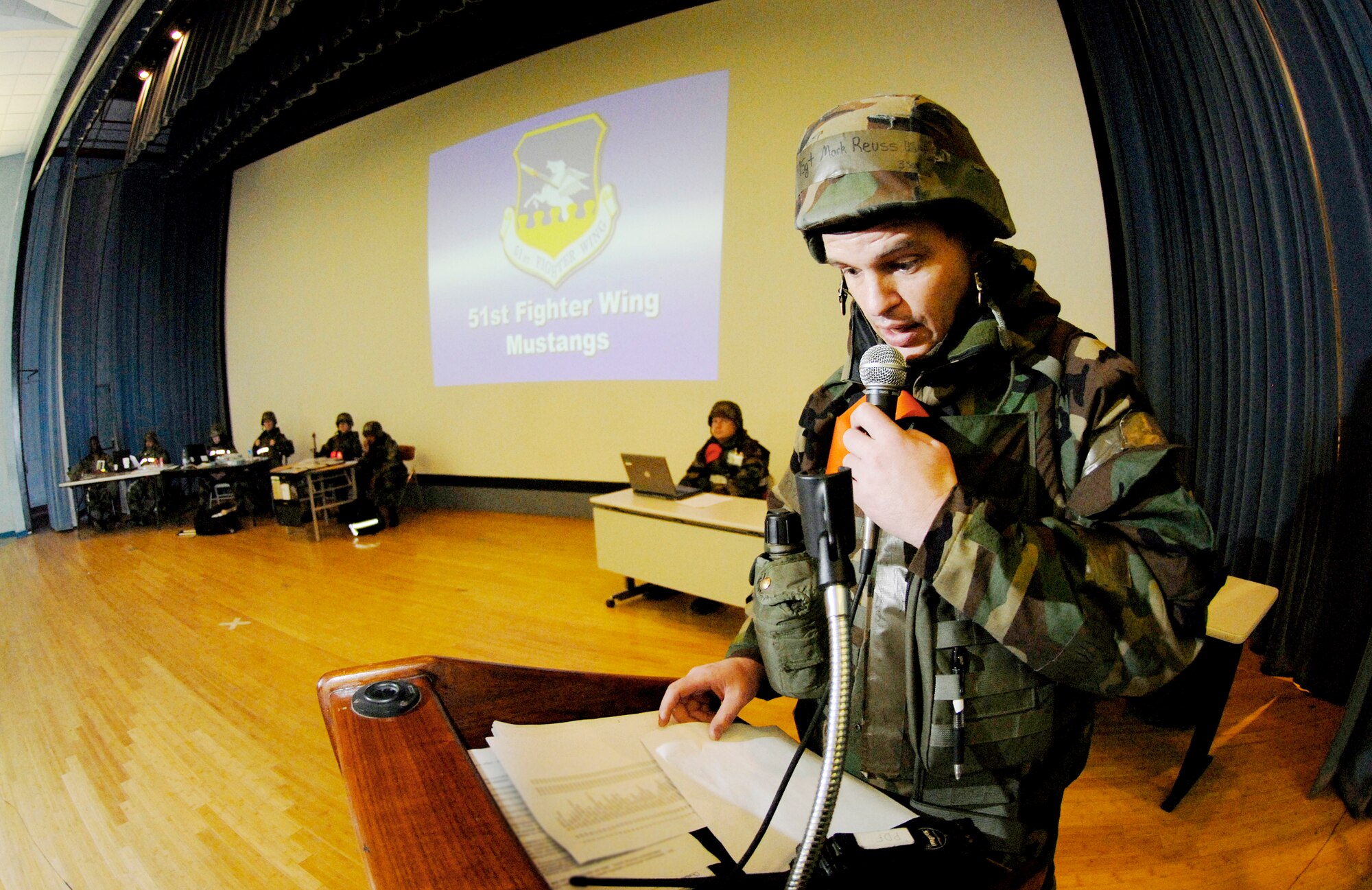 Master Sgt. Mark Reuss conducts accountability of Airmen present at the base's reception processing unit during an operational readiness exercise in July 2009 at Osan Air Base, South Korea. As new Airmen arrive during exercises or contingencies, they are processed through the RPU, which is where checks are made to make sure they have all basic mobility items. Sergeant Reuss is assigned to the 51st Force Support Squadron. (U.S. Air Force photo/Staff Sgt. Brian Ferguson)
