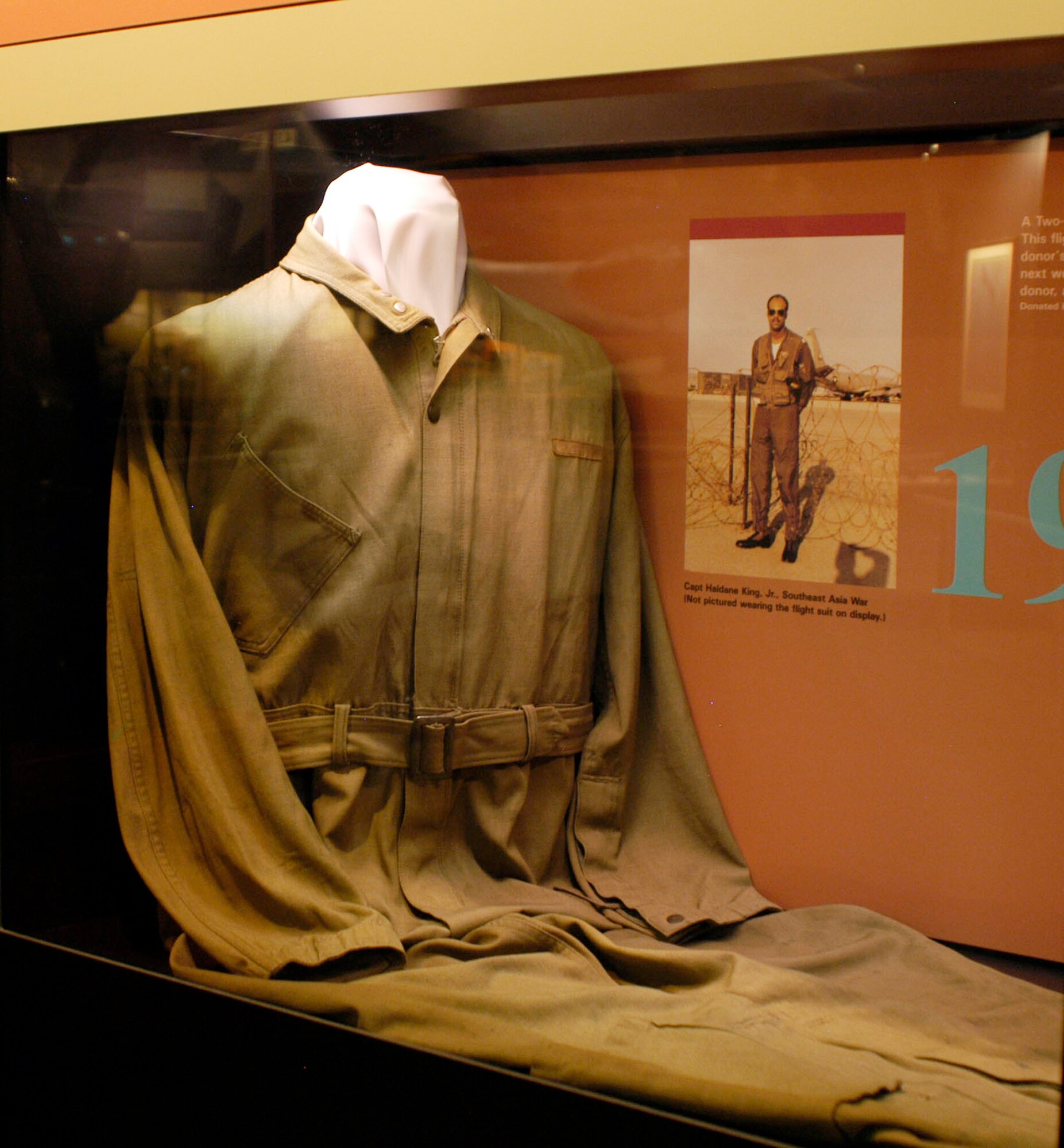 A flightsuit worn in two different wars by a father and son combination is on display in the Air Power Gallery at the National Museum of the U.S. Air Force in Dayton, Ohio. The suit was worn by a father during World War II and his son during the Vietnam War. (U.S. Air Force photo)