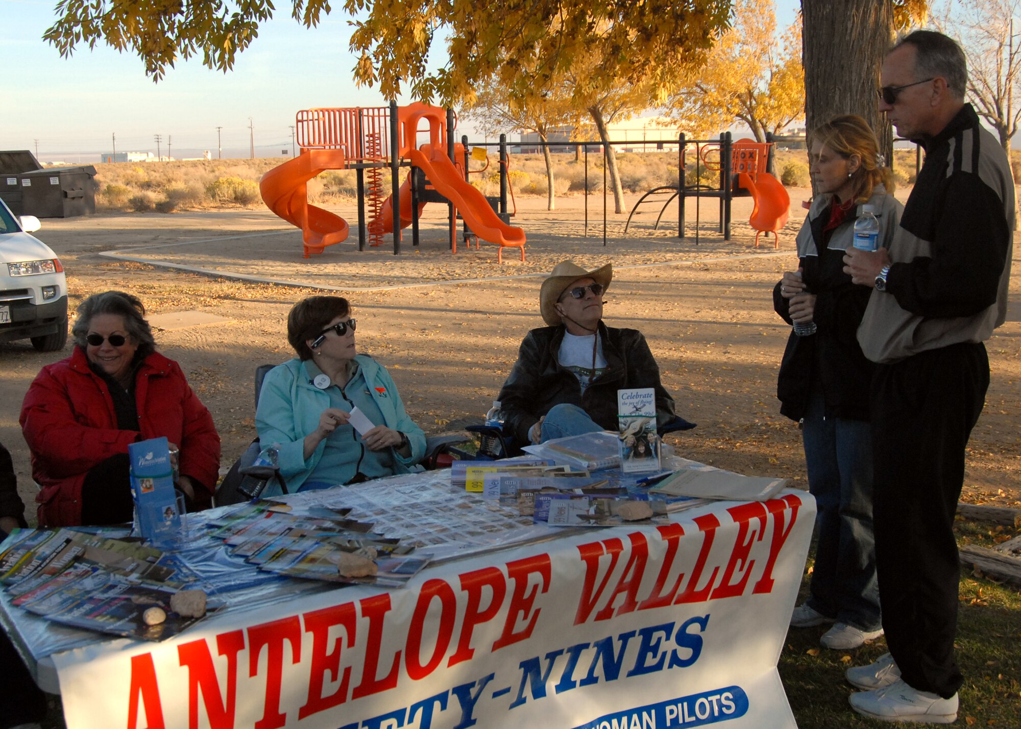 Members of the Ninety-Nines and their families talk to attendees of Pancho Barnes Day Nov. 7. Pancho Barnes Day is an annual event, held to recognize the contributions of females made to aviation. (Air Force photo/William O'Brien) 