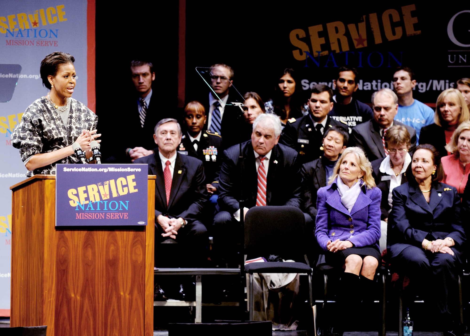 First lady Michelle Obama speaks to an audience of students, university leaders and servicemembers at a celebration of Veterans Day at George Washington University in Washington, D.C., Nov. 11. She shared her thoughts on public service, from military service to local community projects. (Department of Defense photo/Ian Graham)