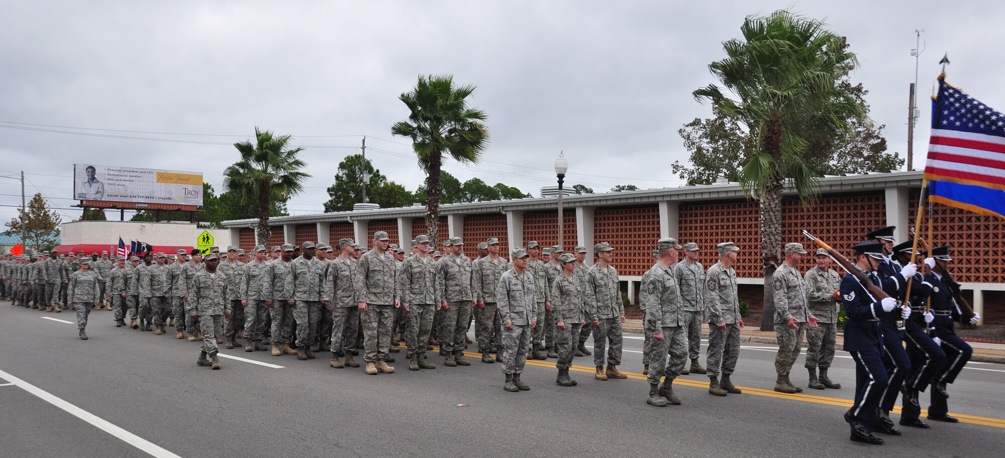Team Tyndall march in the Veteran's parade, downtown Panama City Nov. 11 in rememberance of those who have served in the Armed Forces. (U.S. Air Force photo by Airman 1st Class Rachelle Elsea)