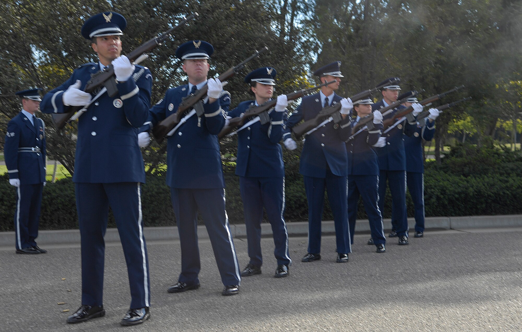 VANDENBERG AIR FORCE BASE, Calif. --  To honor the fallen Air Force security forces members, Vandenberg's Honor Guard provides a 21 gun salute during the 30th Security Forces Squadron's memorial ceremony here Tuesday, Nov. 10, 2009. The ceremony was in memory of two Airmen, 1st Lt. Joseph D. Helton and Airman 1st Class Jason D. Nathan, who made the ultimate sacrifice during their duties while deployed in support of Operation Iraqi Freedom. (U.S. Air Force photo/Airman 1st Class Andrew Lee) 
 