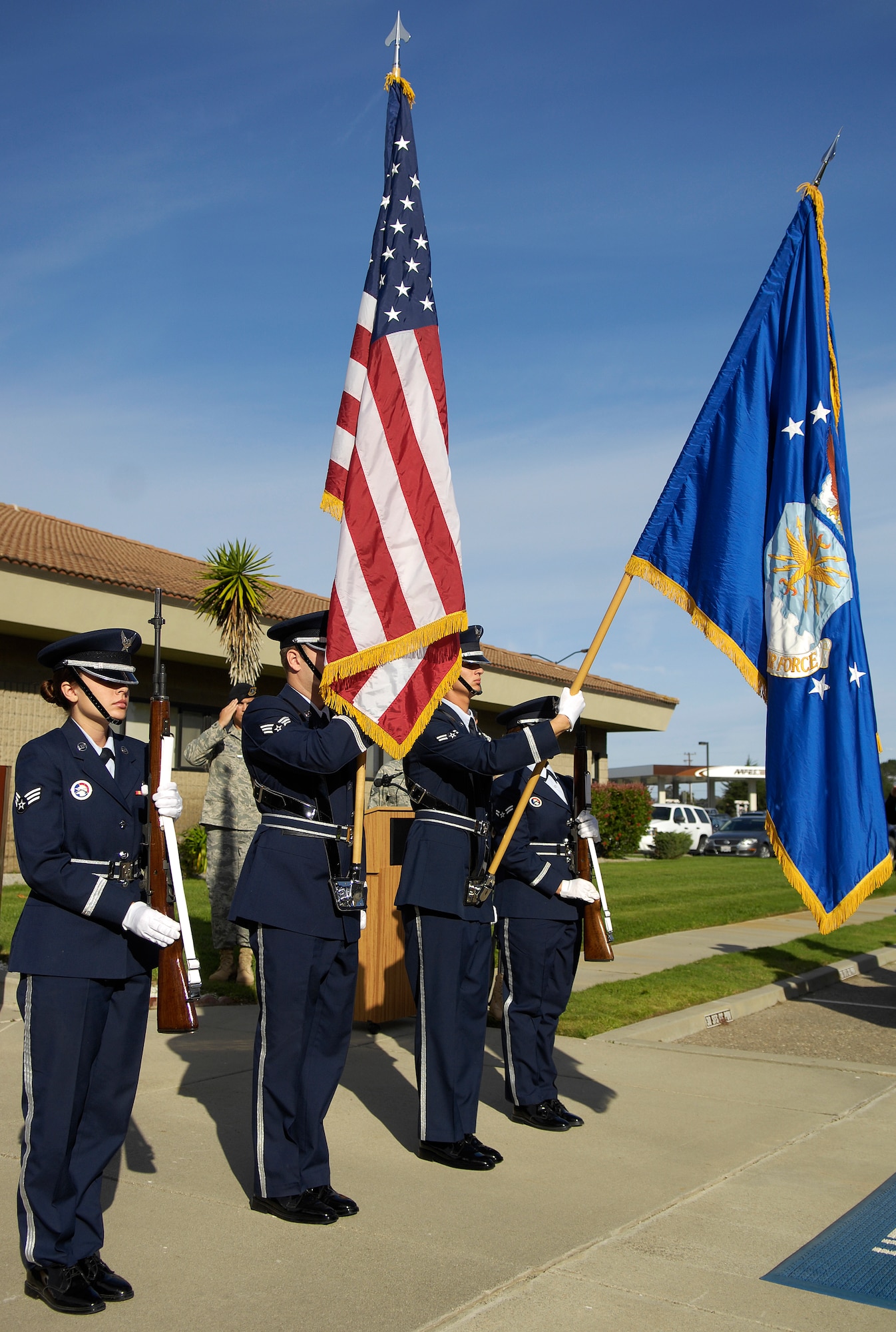 VANDENBERG AIR FORCE BASE, Calif. --  In honor of the fallen security forces members, Vandenberg's Honor Guard presents the colors during the 30th Security Forces Squadron's memorial ceremony here Tuesday, Nov. 10, 2009. The ceremony was in memory of two fallen Airmen, 1st Lt. Joseph D. Helton and Airman 1st Class Jason D. Nathan, who made the ultimate sacrifice during their duties while deployed in support of Operation Iraqi Freedom. (U.S. Air Force photo/Airman 1st Class Andrew Lee) 
 