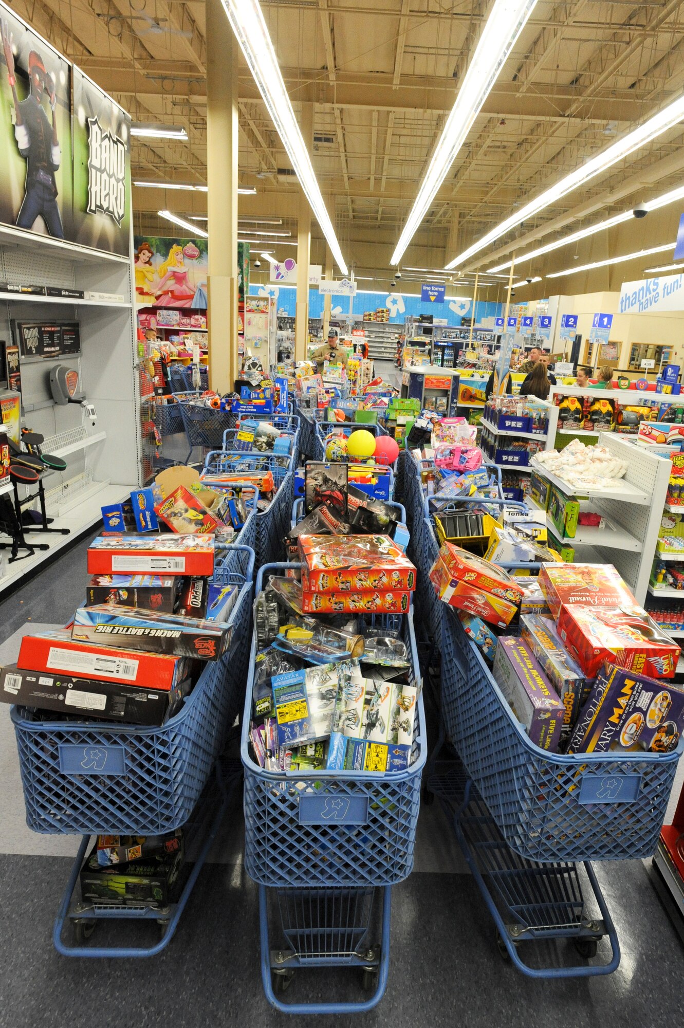 ANCHORAGE -- Rows of carts filled with toys for different age groups, await check out during the Toys For Tots, Toys R' Us purchase. The toys are being collected by The United States Marine Corp and will be delivered to villages across the state in remote locations. (U.S. Air Force Photo/ Staff Sgt. Joshua Garcia)