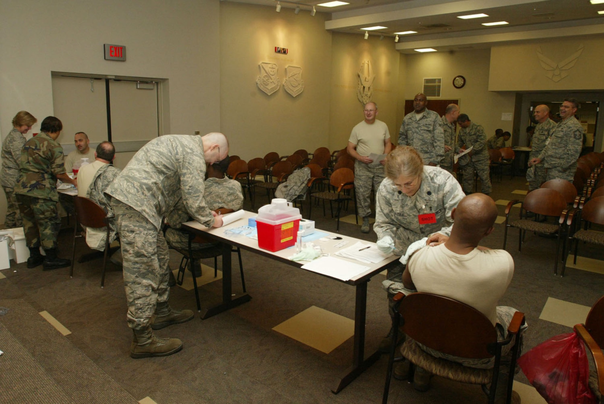 During a base wide flu vaccination program held at the 22nd Air Force headquarters building Nov. 7, vaccines were administered to Reservists in the form of upper arm injections or nasal mist. (U.S. Air Force photo/Don Peek)