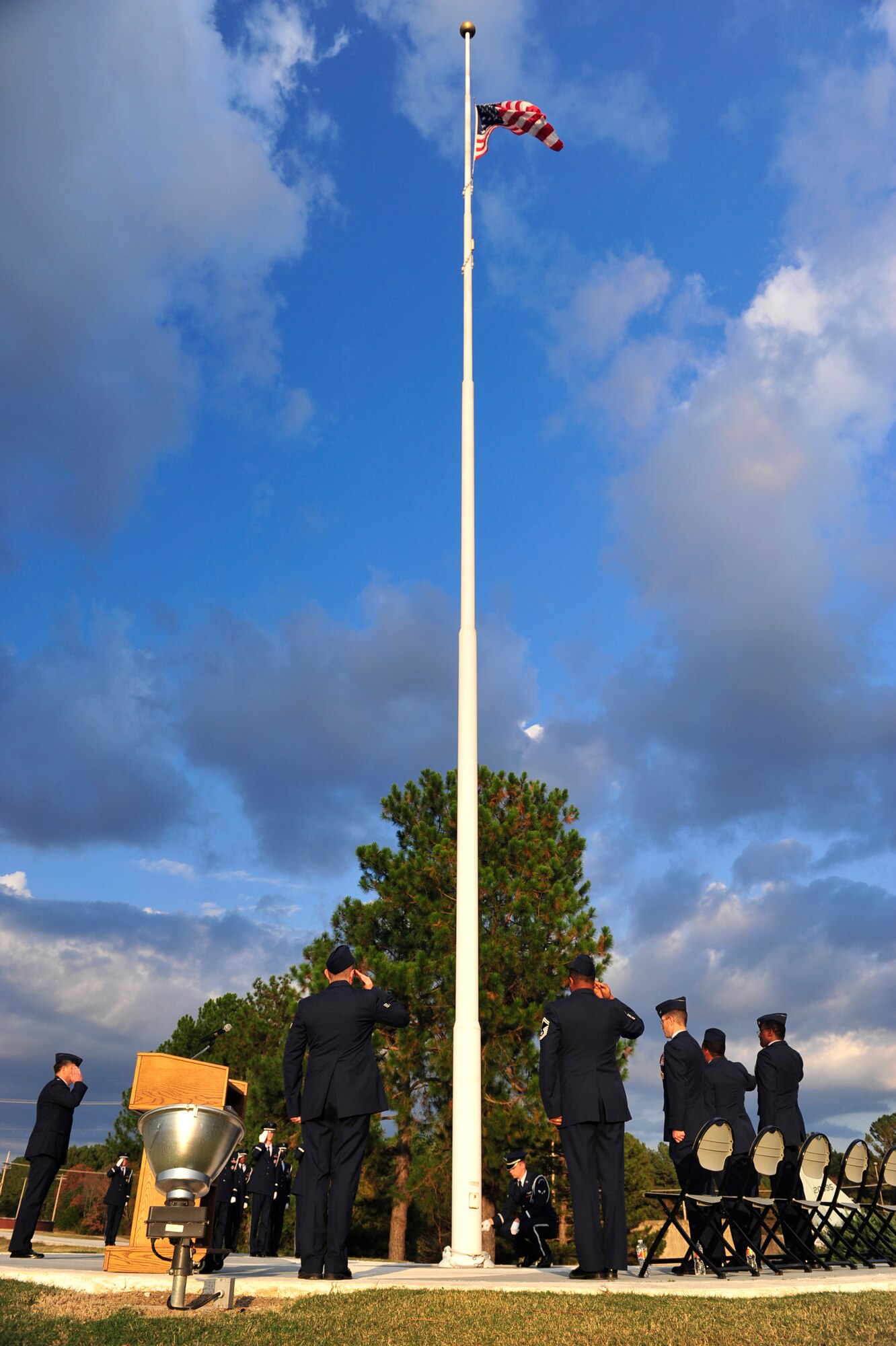 Base personnel salute the flag during a Veterans Day retreat Nov. 10 at Little Rock Air Force Base. On June 1, 1954 Congress voted to change Nov. 11 from “Armistice Day” to “Veterans Day” to honor American Veterans of all wars.  (U.S. Air Force photo by Airman 1st Class Lausanne Pacheco)