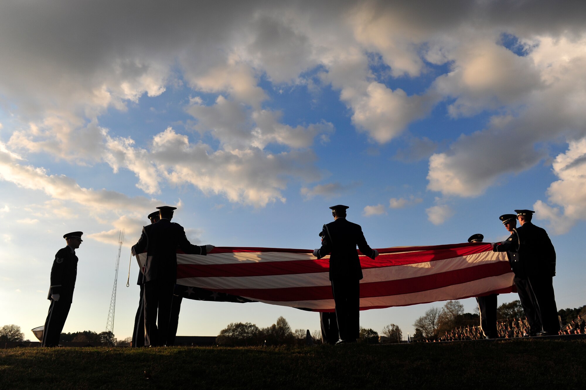 Base honor guard members fold the flag at a Veterans Day Retreat Nov. 10 at Little Rock Air Force Base. On June 1, 1954 Congress voted to change Nov. 11 from “Armistice Day” to “Veterans Day” to honor American Veterans of all wars.  (U.S. Air Force photo by Airman 1st Class Lausanne Pacheco)