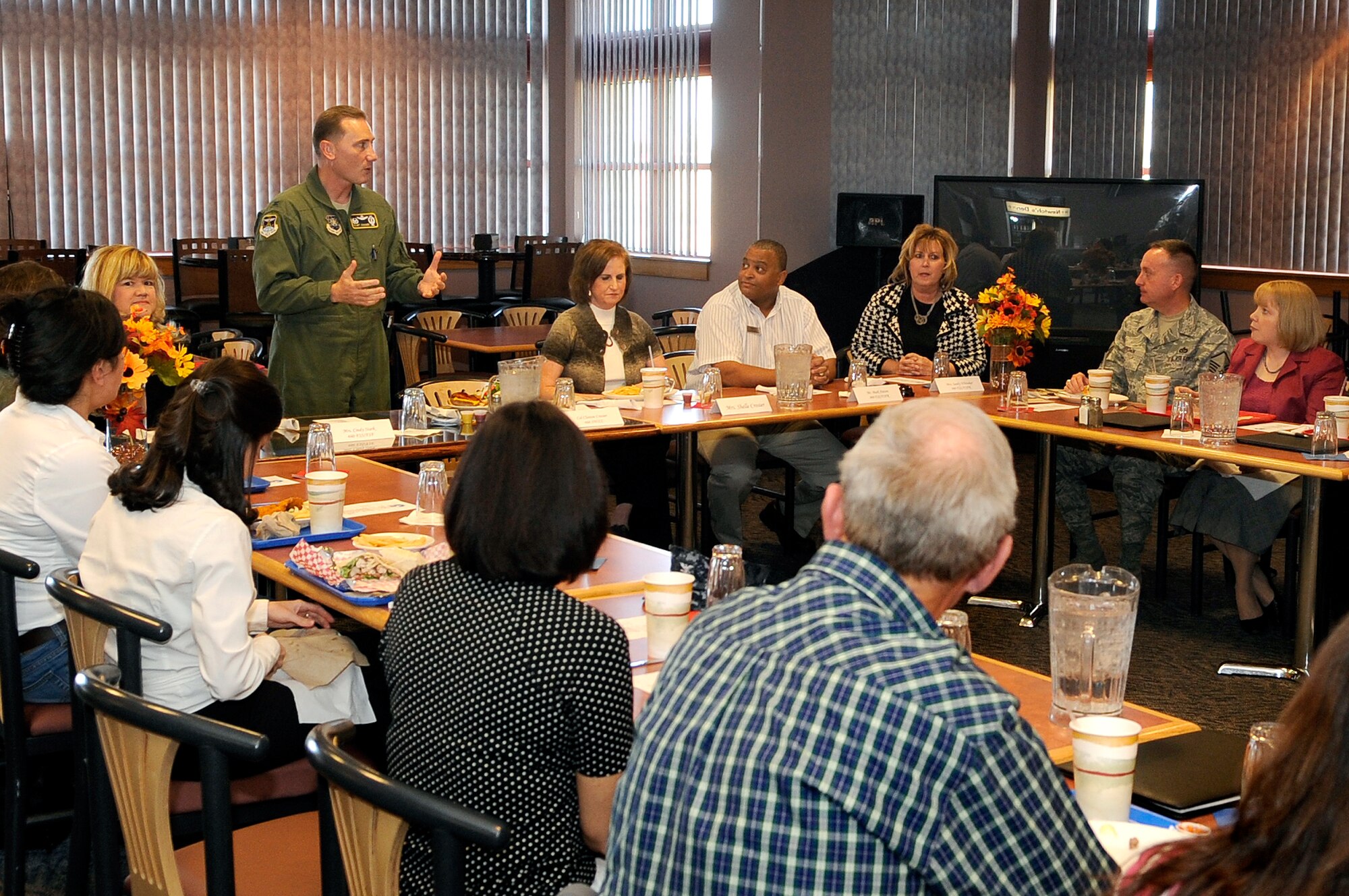 BUCKLEY AIR FORCE BASE, Colo. -- Col. Clint Crosier, 460th Space Wing Commander, speaks with members of Team Buckley and their spouses during lunch Nov. 6. (U.S. Air Force photo by Staff Sgt. Steve Czyz)