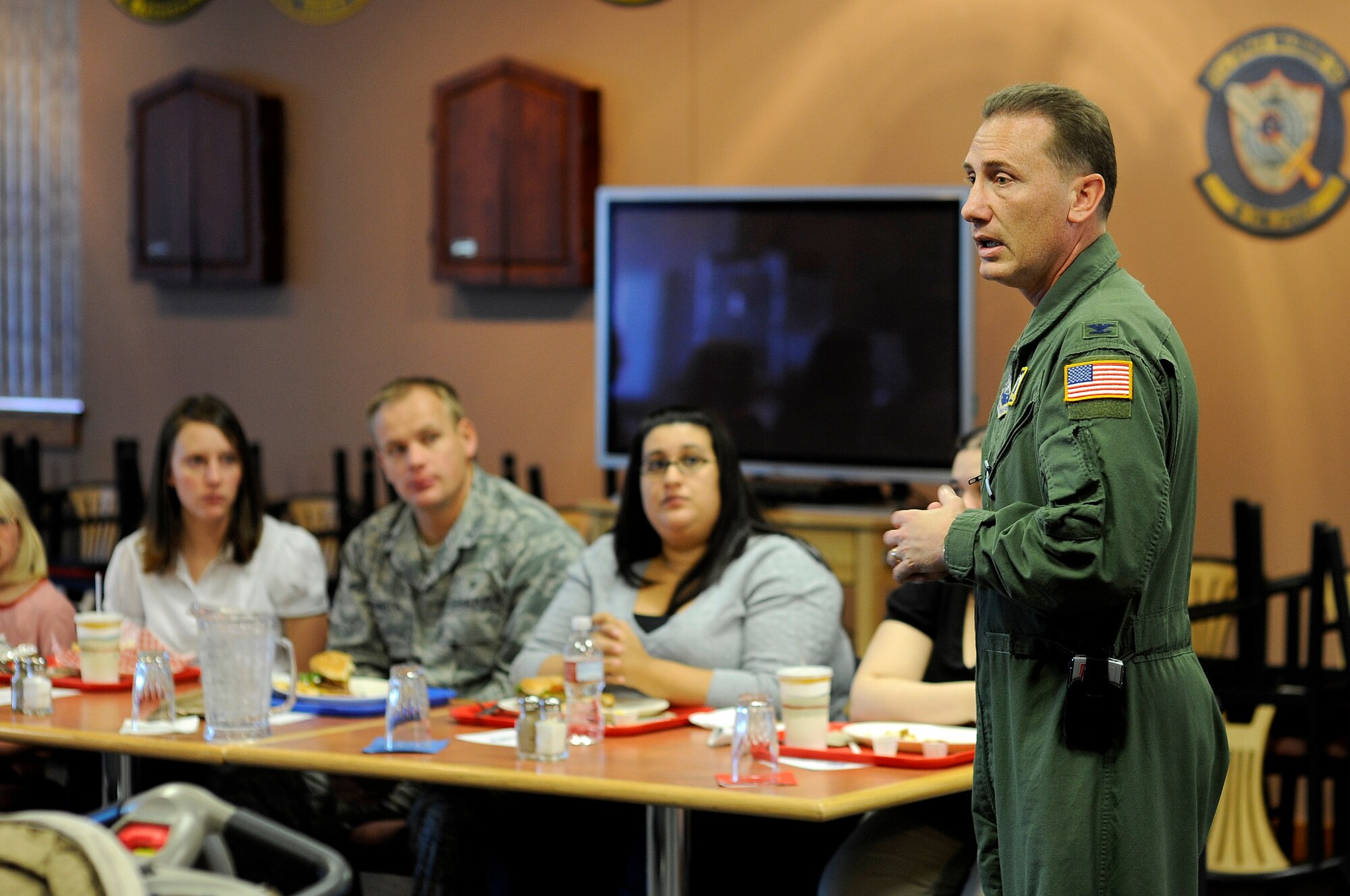 BUCKLEY AIR FORCE BASE, Colo. -- Col. Clint Crosier, 460th Space Wing Commander, speaks with members of Team Buckley and their spouses during lunch Nov. 6. (U.S. Air Force photo by Staff Sgt. Steve Czyz)