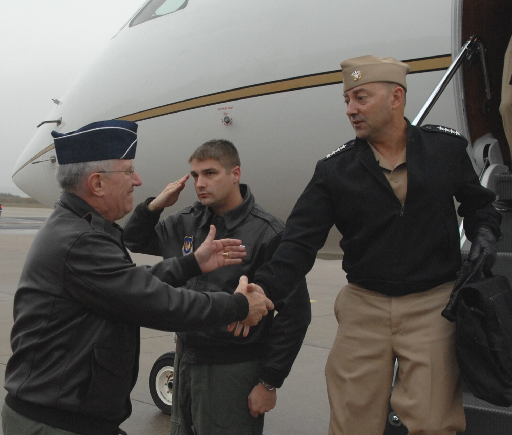 RAMSTEIN AIR BASE, Germany --Adm. James Stavridis, commander of U.S. European Command and Supreme Allied Commander in Europe, is greeted by Gen. Roger Brady, commander of U.S. Air Forces in Europe, at his arrival here Nov. 10. Admiral Stavridis met with General Brady to discuss USAFE's vital role in accomplishing the EUCOM mission. (U.S. Air Force photo/Master Sgt. Corey Clements)