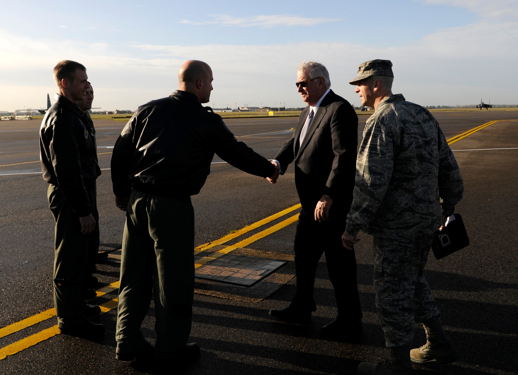 RAF MILDENHALL, England -- Louis Susman, U.S. Ambassador to the U.K., greets the crew of a KC-135 Stratotanker before touring the aircraft Nov. 12.  The aircraft tour was part of a larger tour of RAFs Mildenhall and Lakenheath.  (U.S. Air Force photo/Staff Sgt. Christopher L. Ingersoll)