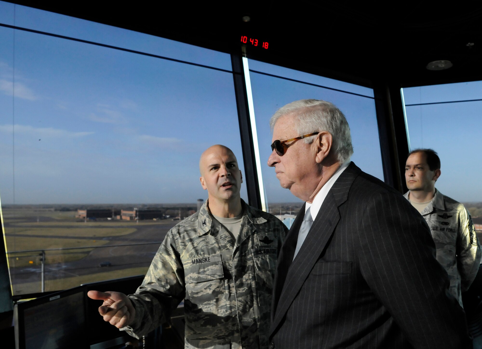 RAF MILDENHALL, England -- U.S. Ambassador to the U.K. Louis Susman gets a view of the base from the control tower Nov. 12 as Col. Chad Manske, 100th Air Refueling Wing commander, explains the mission at RAF Mildenhall.  While at the tower Ambassador Susman was shown some of the challenges and future plans for the base.  (U.S. Air Force photo/Staff Sgt. Christopher L. Ingersoll)