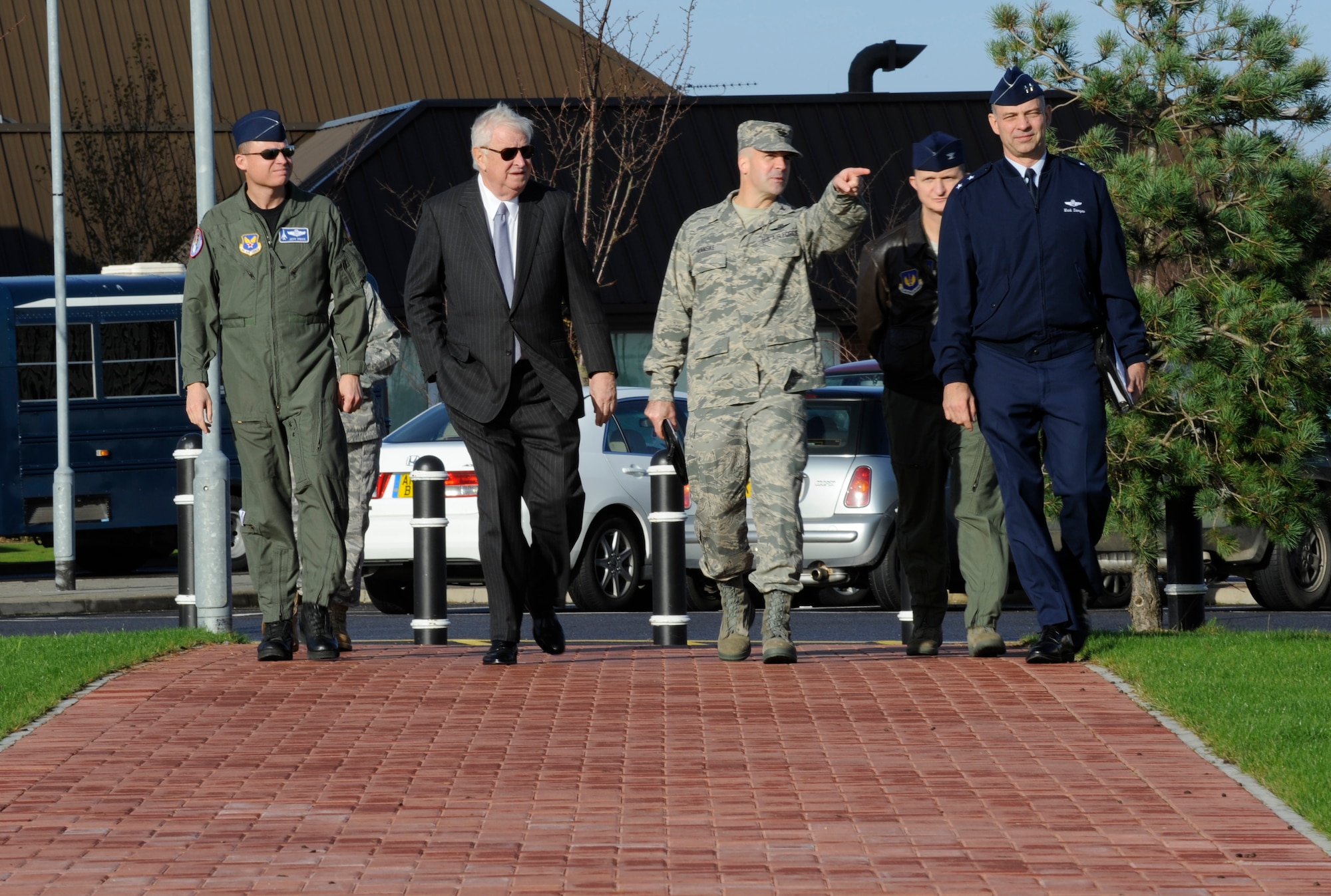 RAF MILDENHALL, England -- U.S. ambassador to the U.K. Louis Susman (second from the left) walks with Maj. Gen. Mark Zamzow, 3rd Air Force vice commander (right), Col. Chad Manske, 100th Air Refueling Wing commander (Second from the right), and Lt. Col. Jeff Price, air attache (left), during the ambassador’s visit to the base Nov. 12.  During the visit, Ambassador Susman toured the control tower, a KC-135 Stratotanker, and presented awards to various individuals.  (U.S. Air Force photo/Staff Sgt. Christopher L. Ingersoll)