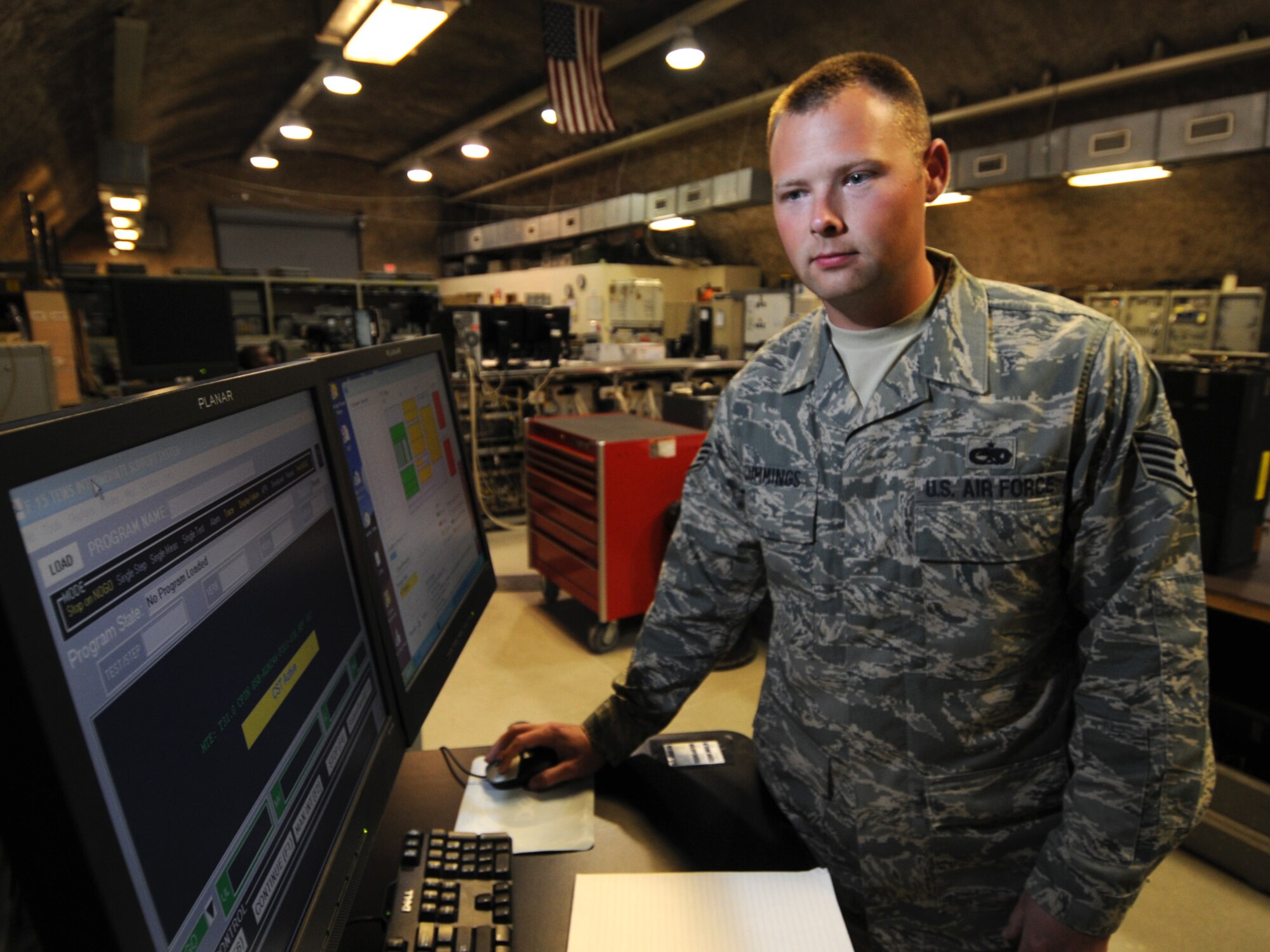 Staff Sgt. Douglas Cummings, 379th Expeditionary Maintenance Squadron avionics team leader, runs confidence diagnostics on an intermediate support station at a deployed location in Southwest Asia, Nov. 9, 2009. The 379 EMXS avionics flight provides support for F-15 Eagles which are deployed to Bagram AB, Afghanistan. Sergeant Cummings is deployed from Seymour-Johnson Air Force Base, N.C. in support of operations Iraqi Freedom and Enduring Freedom. (U.S. Air Force Photo/Tech. Sgt. Jason W. Edwards)