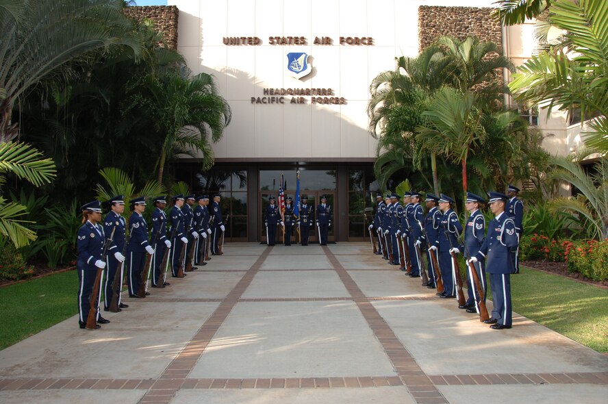 The Hickam Honor Guard awaits the arrival of the Pacific Air Chiefs Oct. 24 at Hickam Air Force Base, Hawaii. The Air Chiefs represent the senior military leadership from countries such as Australia, New Zealand, Singapore and Mongolia. The Air Chiefs were attending the Pacific Air Chiefs' Conference and were greeted by Gen. Gary North, Pacific Air Forces commander. (U.S. Air Force photo/Vanessa Forloine)