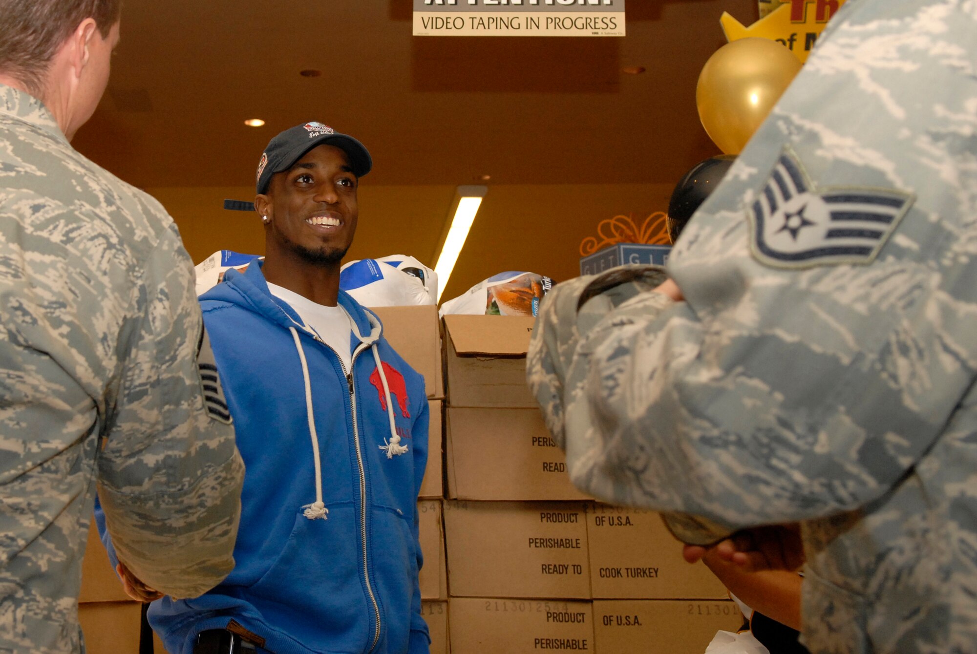 LOMPOC, Calif. – Lydell Sargeant, a native of Lompoc and professional football player, meets with members from Vandenberg Air Force Base. Lydell Sargeant donated approximately 15 Turkeys to the 532nd Training Squadron Maintainers Booster Club. (U.S. Air Force photo/Senior Airman Andrew Satran)