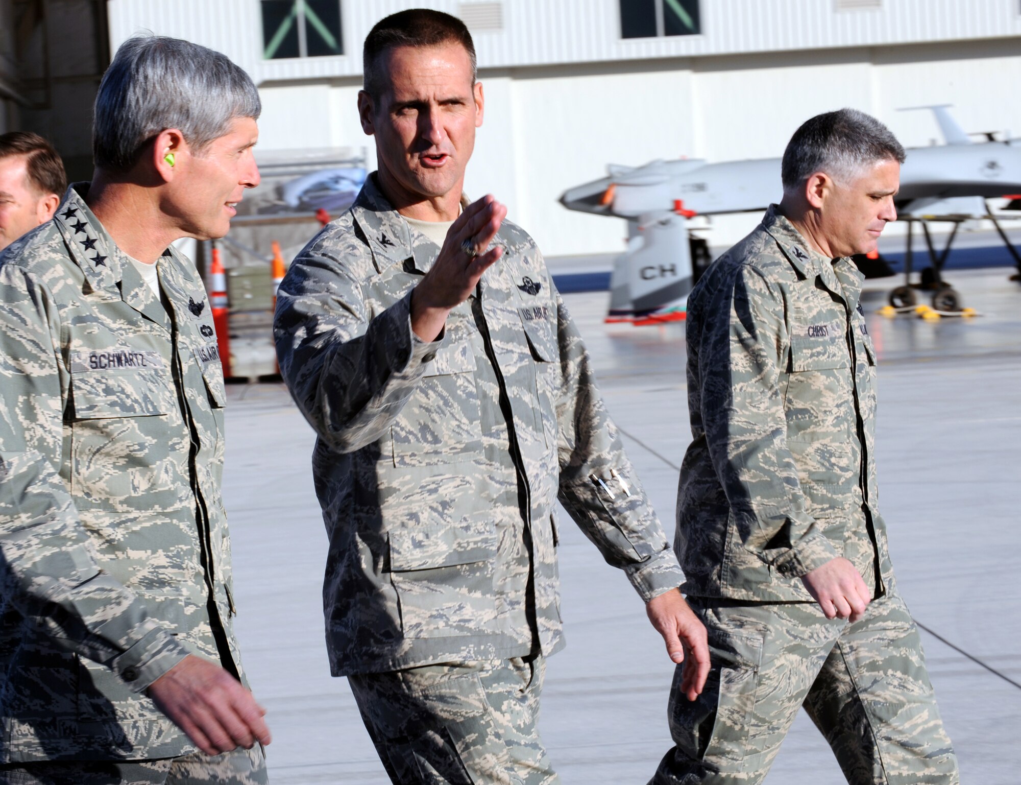 Air Force Chief of Staff Gen. Norton Schwartz, left, walks with Col. Peter Gersten, commander of the 432nd Wing, during a visit to Creech Air Force Base, Nev., the home of the Air Force's first unmanned aircraft systems wing. (U.S. Air Force photo/Airman 1st Class Brett Clashman)