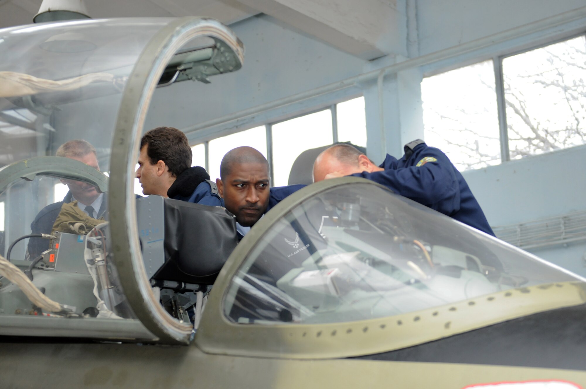 Master Sgt Timothy Barfield, learns about the capabilities of Bulgarian training aircraft during a visit to Dolna Mitropolya Air Force Training Base, in Bulgaria Nov. 6, 2009. Sergeant Barfield is the USAFE command chief executive assistant. (U.S. Air Force photo/Master Sgt. Gino Mattorano)