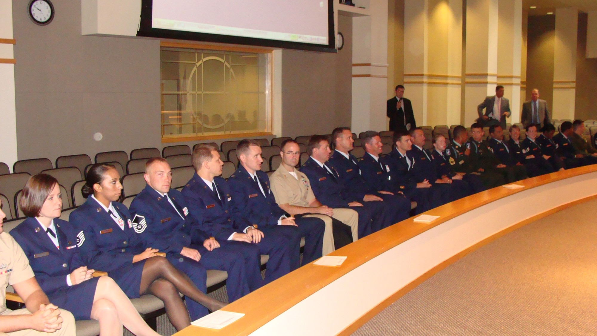 Team Eglin Warriors wait in the visitors' section before stepping on to the Florida Senate floor.  Two dozen Airmen attended the day's events; many are recent returnees from deployments supporting Operations Enduring Freedom and Iraqi Freedom. (courtesy photo)