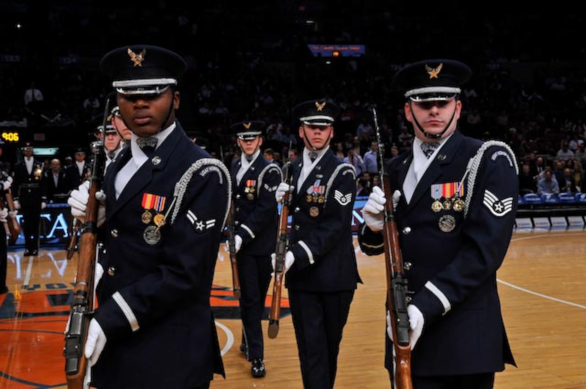 Airman 1st Class Doyle Boyd and Staff Sgt. Adam Clonick, United States Air Force Honor Guard Drill Team members, perform the matrix meat grinder, one of many drill movements, during the New York Knick’s halftime show during Military Appreciation Night at New York’s Madison Square Garden Nov. 11. The Drill Team is the traveling component of the U.S. Air Force Honor Guard and tours worldwide representing all Airmen while showcasing Air Force precision and professionalism. (U.S. Air Force photo by Senior Airman Marleah Miller)