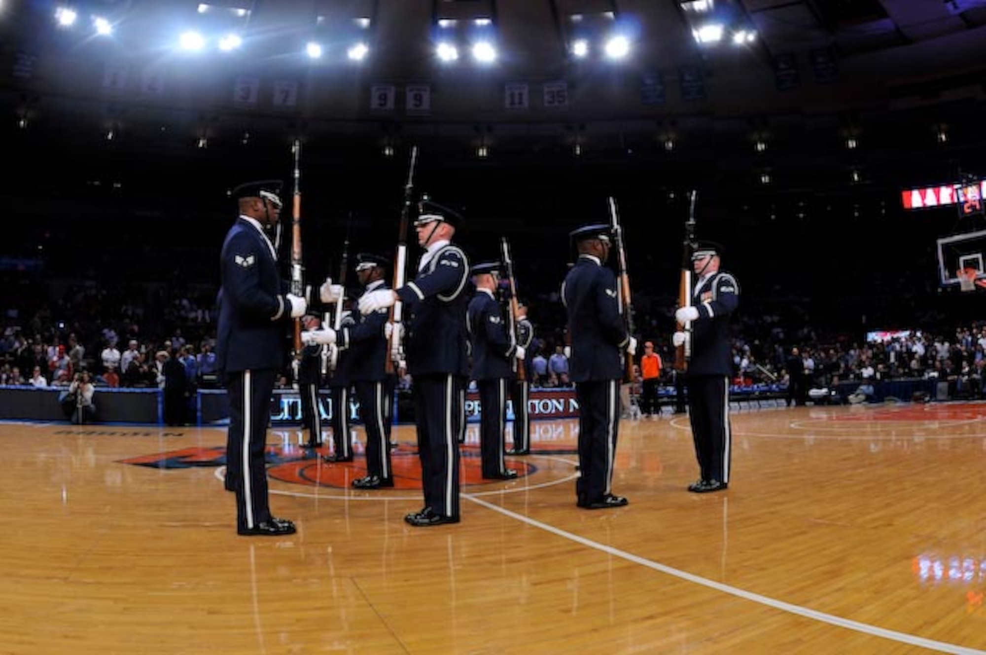 The United States Air Force Honor Guard Drill Team executes double comeback and double spins during their performance at the New York Knick’s halftime show during Military Appreciation Night at New York’s Madison Square Garden Nov. 11.  The Drill Team is the traveling component of the U.S. Air Force Honor Guard and tours worldwide representing all Airmen while showcasing Air Force precision and professionalism. (U.S. Air Force photo by Senior Airman Marleah Miller)