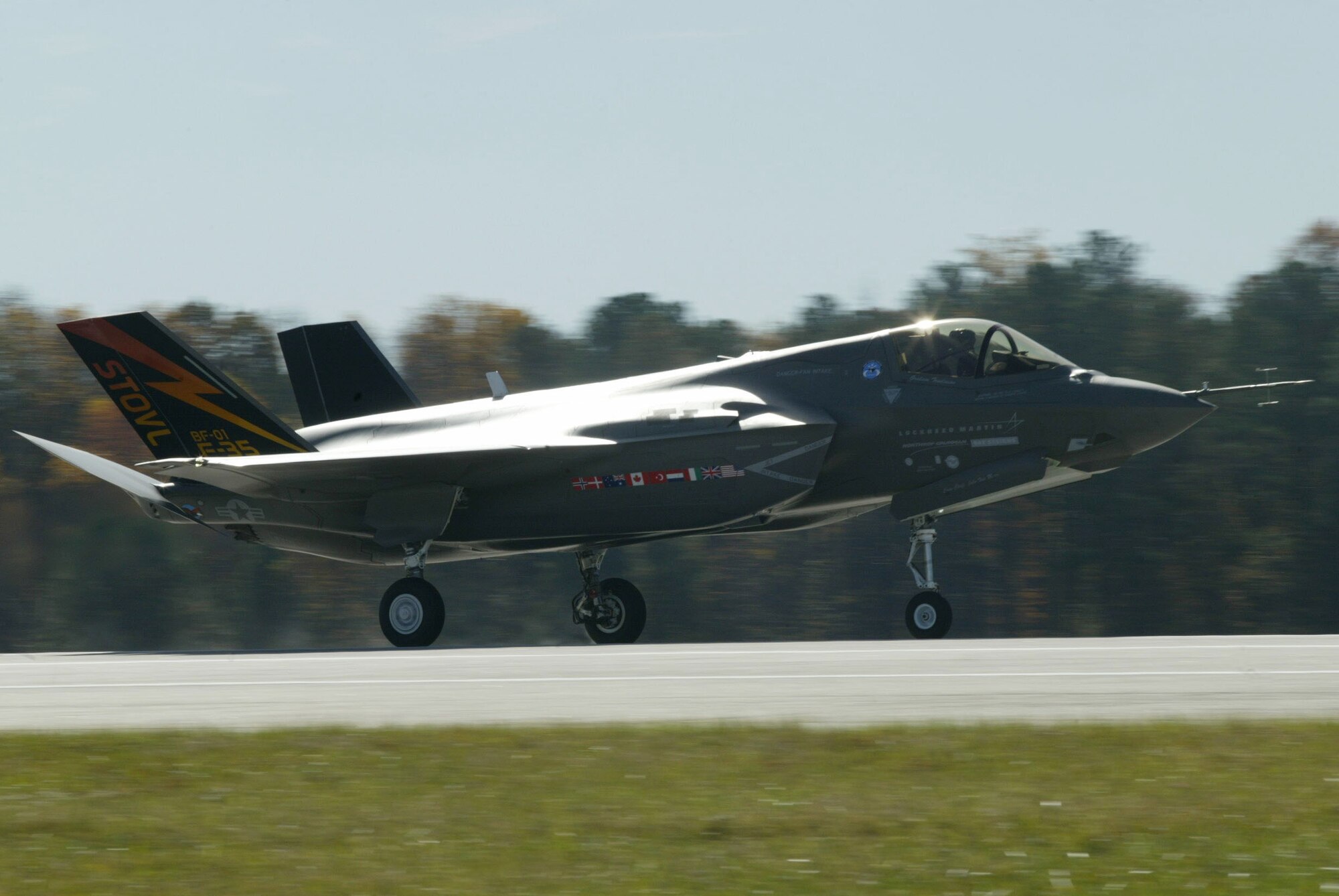 An F-35 Joint Strike Fighter lands at Dobbins Air Reserve Base, Ga. Nov. 13 during a cross-country flight. The F-35 is a stealthy, single-engine, supersonic multi-role fighter that will replace a variety of aging fighter and strike aircraft for the Air Force, Navy, Marine Corps and allied defense forces. (U.S. Air Force photo/Don Peek)