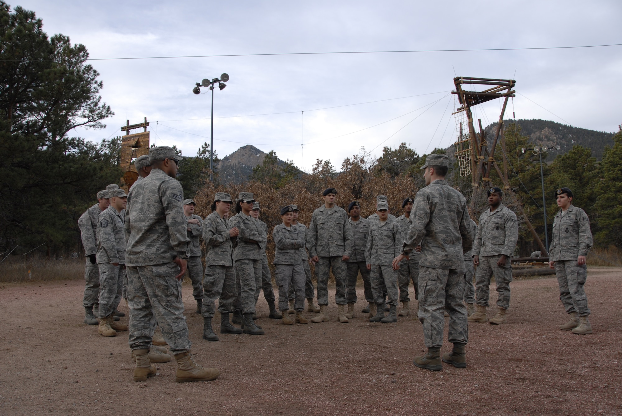 HANSCOM AIR FORCE BASE, Mass. - 1st Lt. Andrew Ramsey, operational contract manager with the 66th Contracting Squadron, addresses a group of Airmen from Hanscom just before they engage in confidence- and team-building events at the Adventure Based Learning Course at the U.S. Air Force Academy in Colorado Springs, Colo. The Airmen returned from their four-day trip Nov. 8. (U.S. Air Force photo by Capt. Geoff Buteau)