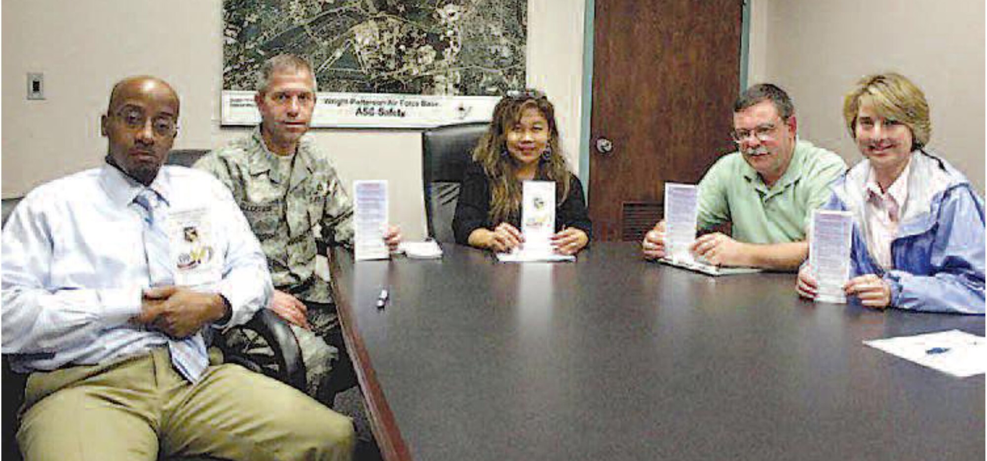 WRIGHT-PATTERSON AIR FORCE BASE, Ohio - Kelley Hill, WPAFB VPP coordinator; Tech. Sgt. Dave Ellcessor,
445th Ground Safety technician), Simone Koram, WPAFB VPP
manager; Larry Stulz, 445th Safety manager and Tech Sgt. Lisa
Quinn, 445th assistant Maintenance Training manager). The
445h VPP Team led by Stulz met with the WPAFB VPP Team to
discuss the VPP Application Process. “The 445th VPP Team got
infected with the “VPP Fever” and are aggressively taking the
steps...reaching for that VPP Star!” said Koram. (Courtesy photo)