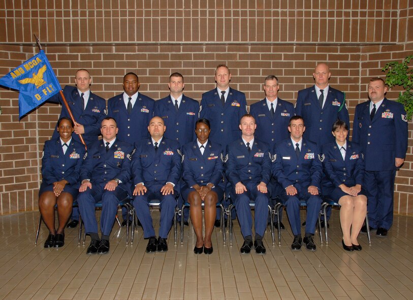 McGHEE TYSON AIR NATIONAL GUARD BASE, Tenn. -- NCO Academy Class 10-1, D-Flight, gathers at The I.G. Brown Air National Guard Training and Education Center here, Oct. 19, 2009.  Pictured (L-R standing) are Staff. Sgt. Travis A. Swihart, Tech. Sgt. Bradley L. Tabron, Tech. Sgt. Robert F. Walsh, Tech. Sgt. Joseph B. Prouse, Tech. Sgt. Bruce E. Hurley, Tech. Sgt. Everett J. Skinner, Tech. Sgt Glen Weaver, instructor, (L-R sitting) Tech. Sgt. Keisha S. McCormick, Tech. Sgt. John C. Scobie, Tech. Sgt. Joseph Guerrero, Tech. Sgt. Yolonda C. Davis, Tech. Sgt. Glenn J. Ferguson, Tech. Sgt. Shane L. Schuelke, and Tech. Sgt. Jodi L. Habbinger.  (U.S. Air Force photo by Master Sgt. Kurt Skoglund/Released)