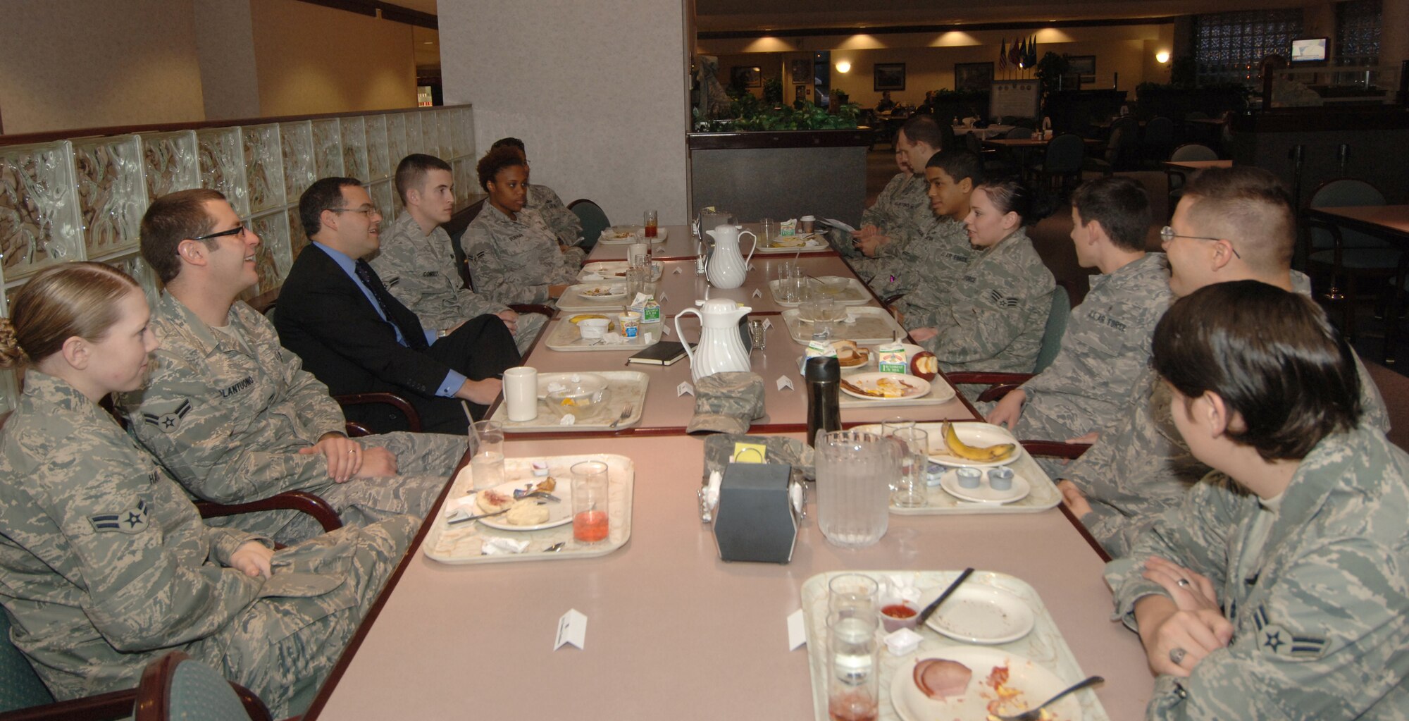 The Honorable Daniel B. Ginsberg, assistant secretary of the Air Force for manpower and Reserve affairs, enjoys breakfast with Airmen from Grand Forks Air Force Base during a base visit Nov. 11 to 13. (U.S. Air Force photo by Senior Airman R. Michael Longoria)