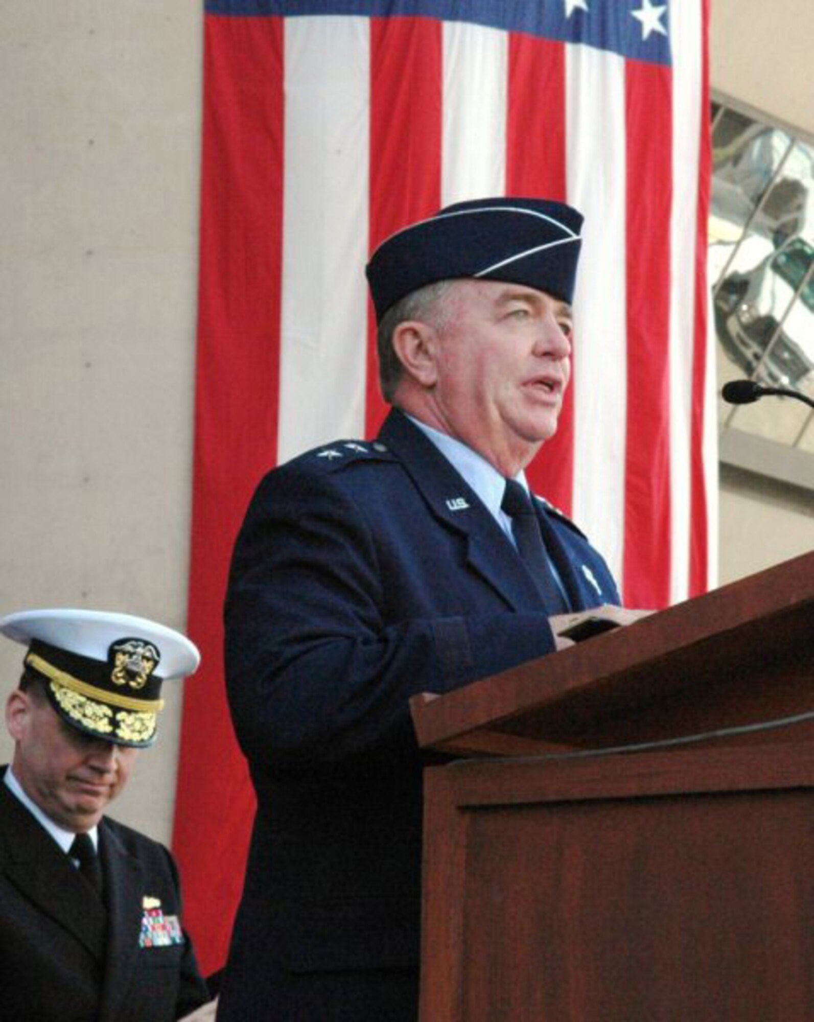 Maj. Gen. Tom Travis, commander, 59th Medical Wing, speaks at the 12th Annual Dallas Veterans Day Parade Nov. 11. The theme of this year's event was "Saluting the Military Medical Corps."  General Travis also administered the oath for more than 100 new enlistees in the armed forces in a pre-parade ceremomy. (Courtesy photo) 