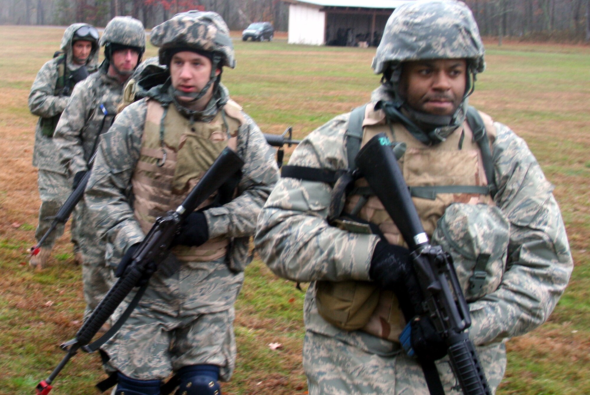 Students in the Combat Airman Skills Training Course 10-1A practices dismounted patrolling tactics during course training on Nov. 12, 2009, on a range at Joint Base McGuire-Dix-Lakehurst, N.J.  The course, taught by the U.S. Air Force Expeditionary Center's 421st Combat Training Squadron, prepares Airmen for upcoming deployments.  (U.S. Air Force Photo/Staff Sgt. Robert Sizelove)