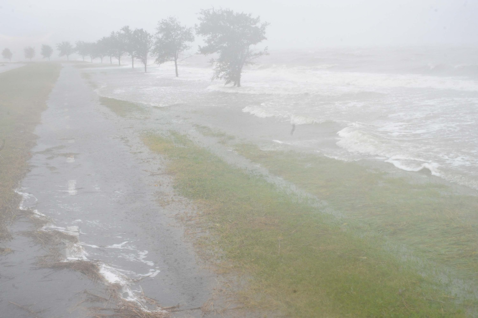 LANGLEY AIR FORCE BASE, Va. – Water from the bay floods the coastline near the Bayside Enlisted Club Nov. 12.  A nor'easter dropped 8-10 inches of rain on Langley over the course of three days with wind gusts up to 55 mph.  (U.S. Air Force photo/Staff Sgt. Barry Loo)