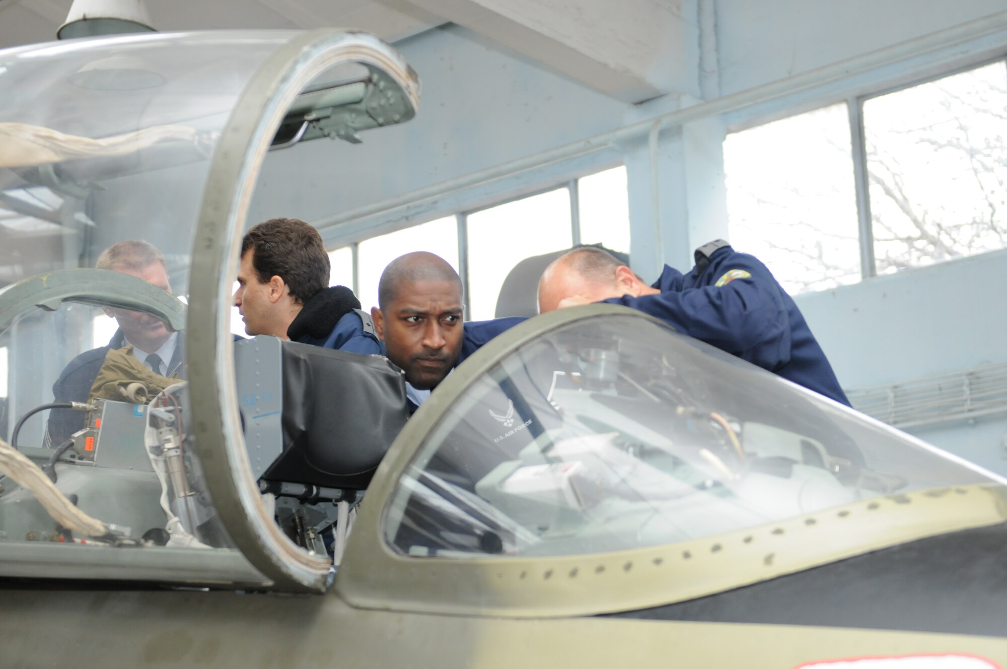 Master Sgt Timothy Barfield, USAFE command chief executive assistant, learns about the capabilities of Bulgarian training aircraft during a visit to Dolna Mitropolya Air Force Training Base, in Bulgaria Nov. 6. (U.S. Air Force photo by MSgt Gino Mattorano)