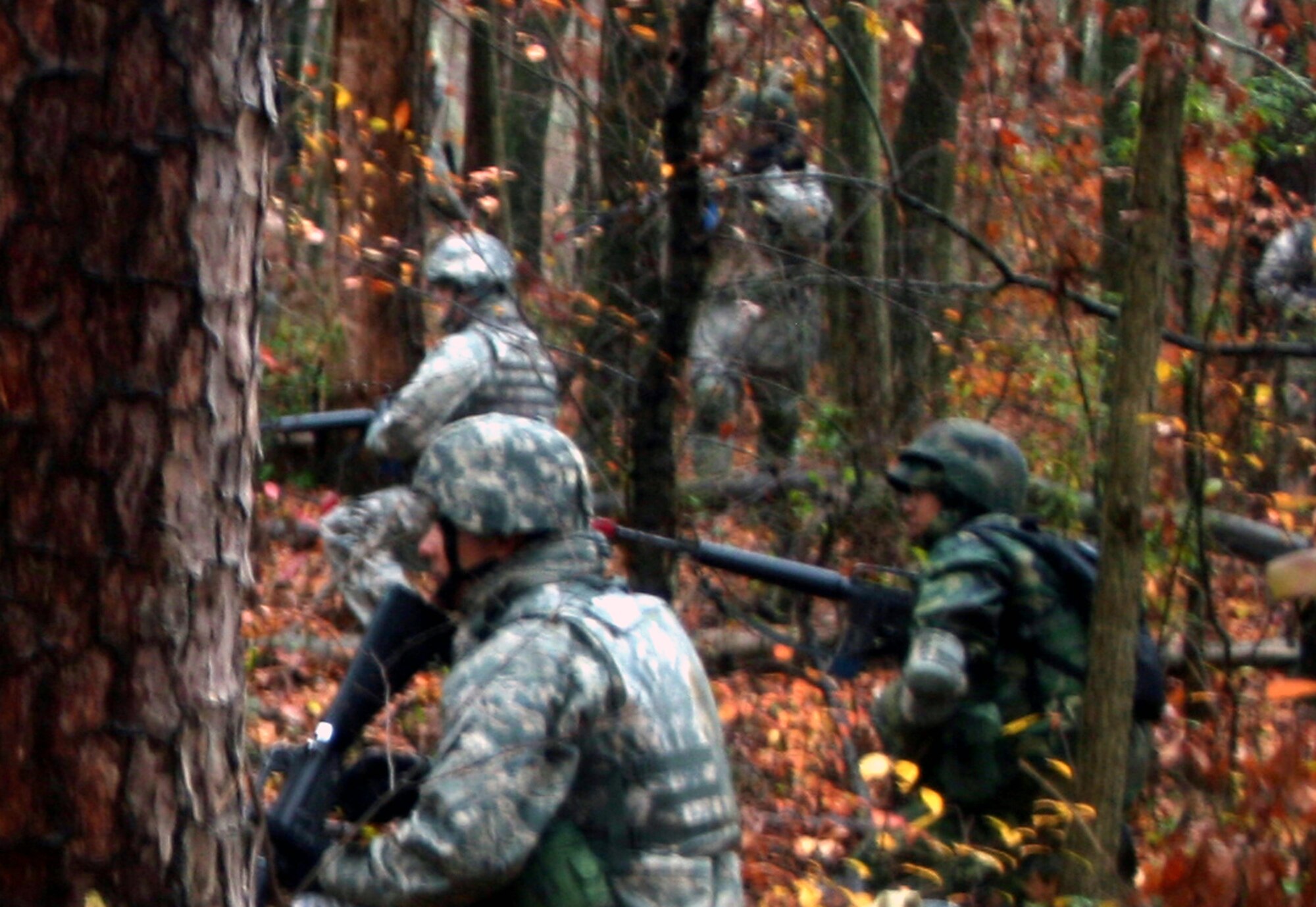 Students in the Combat Airman Skills Training Course 10-1A practice dismounted patrolling tactics during course training on Nov. 12, 2009, on a range at Joint Base McGuire-Dix-Lakehurst, N.J.  The course, taught by the U.S. Air Force Expeditionary Center's 421st Combat Training Squadron, prepares Airmen for upcoming deployments.  (U.S. Air Force Photo/Tech. Sgt. Scott T. Sturkol)