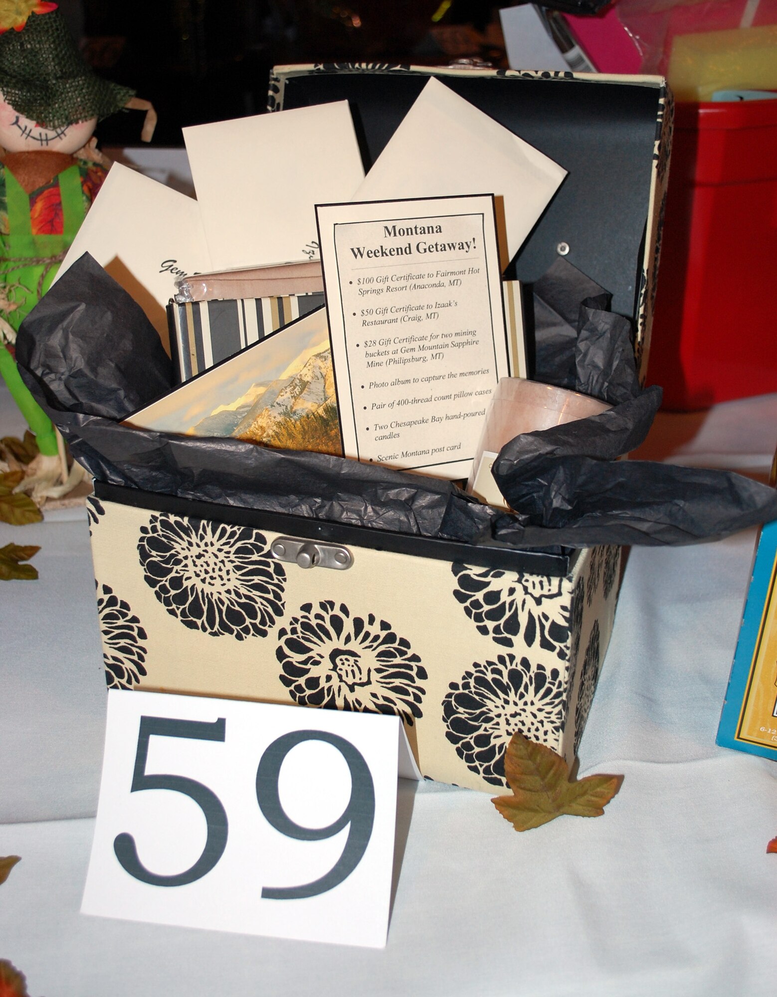 This particular gift basket, entitled "Perfect Mountana Getaway" was sponsored by the 341st Mission Support Group. It included a weekend stay at Fairmont Hot Springs Resort, dinner at Izaak's restaurant and a search for yogo sapphires at Gem Mountain. (U.S. Air Force photo/Valerie Mullett)