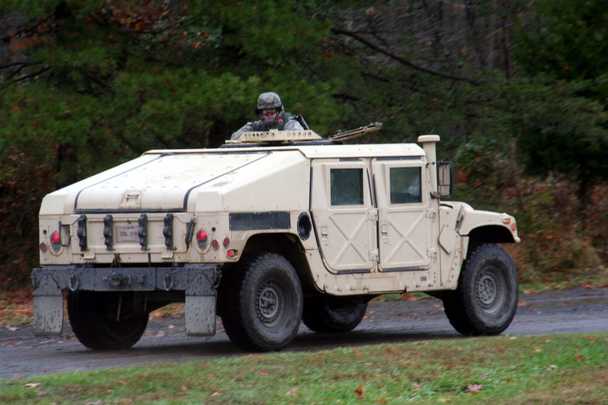 Students in the Combat Airman Skills Training Course 10-1A move out for mounted patrol, or convoy operations, training during a course session on Nov. 12, 2009, on a range at Joint Base McGuire-Dix-Lakehurst, N.J.  The course, taught by the U.S. Air Force Expeditionary Center's 421st Combat Training Squadron, prepares Airmen for upcoming deployments.  (U.S. Air Force Photo/Tech. Sgt. Scott T. Sturkol)