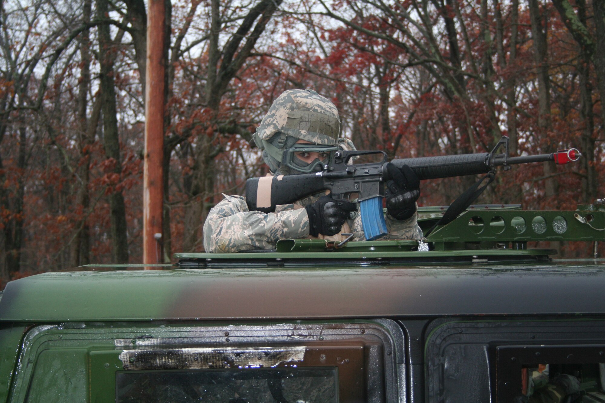 A student in the Combat Airman Skills Training Course 10-1A move out for mounted patrol, or convoy operations, training during a course session on Nov. 12, 2009, on a range at Joint Base McGuire-Dix-Lakehurst, N.J.  The course, taught by the U.S. Air Force Expeditionary Center's 421st Combat Training Squadron, prepares Airmen for upcoming deployments.  (U.S. Air Force Photo/Tech. Sgt. Scott T. Sturkol)