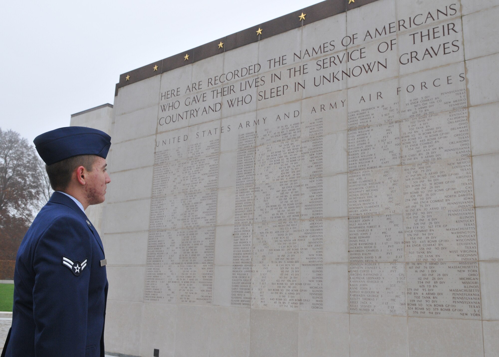 SPANGDAHLEM AIR BASE, Germany -- Airman 1st Class Michael D. Kimball, 52nd Operations Support Squadron, looks at the names of Americans who died in service of their country at the Luxembourg American Cemetery and Memorial in Luxembourg City Nov. 11. More than 5,000 American servicemembers fighting in World War II now rest at the 50.5 acre cemetery, which is one of 14 American cemeteries established overseas after World War II. (U.S. Air Force photo/Airman 1st Class Nick Wilson)