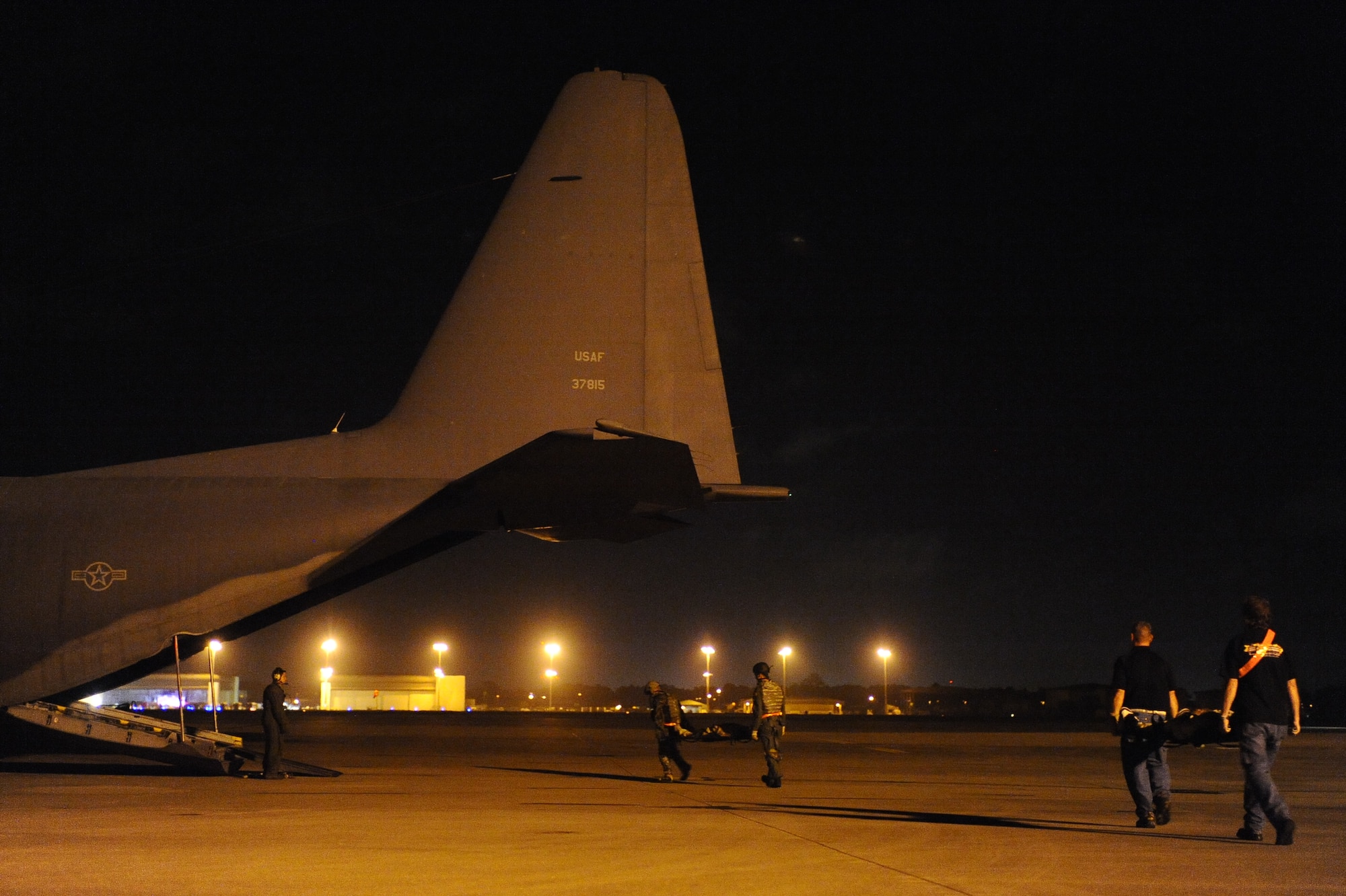 Patients are loaded onto an MC-130E assigned to the 6th Special Operations Squadron during a casualty evacuation training mission, Oct. 27, 2009, Hurlburt Field, Fla. The training mission assessed the ability of flight doctors to evacuate patients from a combat zone. (U.S. Air Force photo by Senior Airman Julianne Showalter/Released)