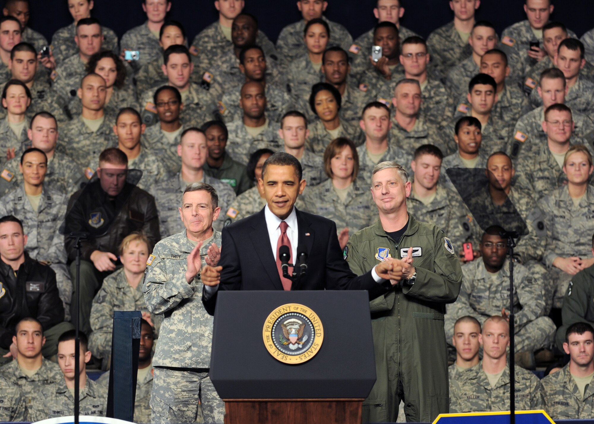 President Barack Obama gives a speech to a crowd of military personnel and civilians gathered Nov. 12, 2009, at Elmendorf Air Force Base, Alaska. The president was at the base to meet with servicemembers and offer remarks to the local community. (U.S. Air Force photo/Senior Airman Laura Turner)
