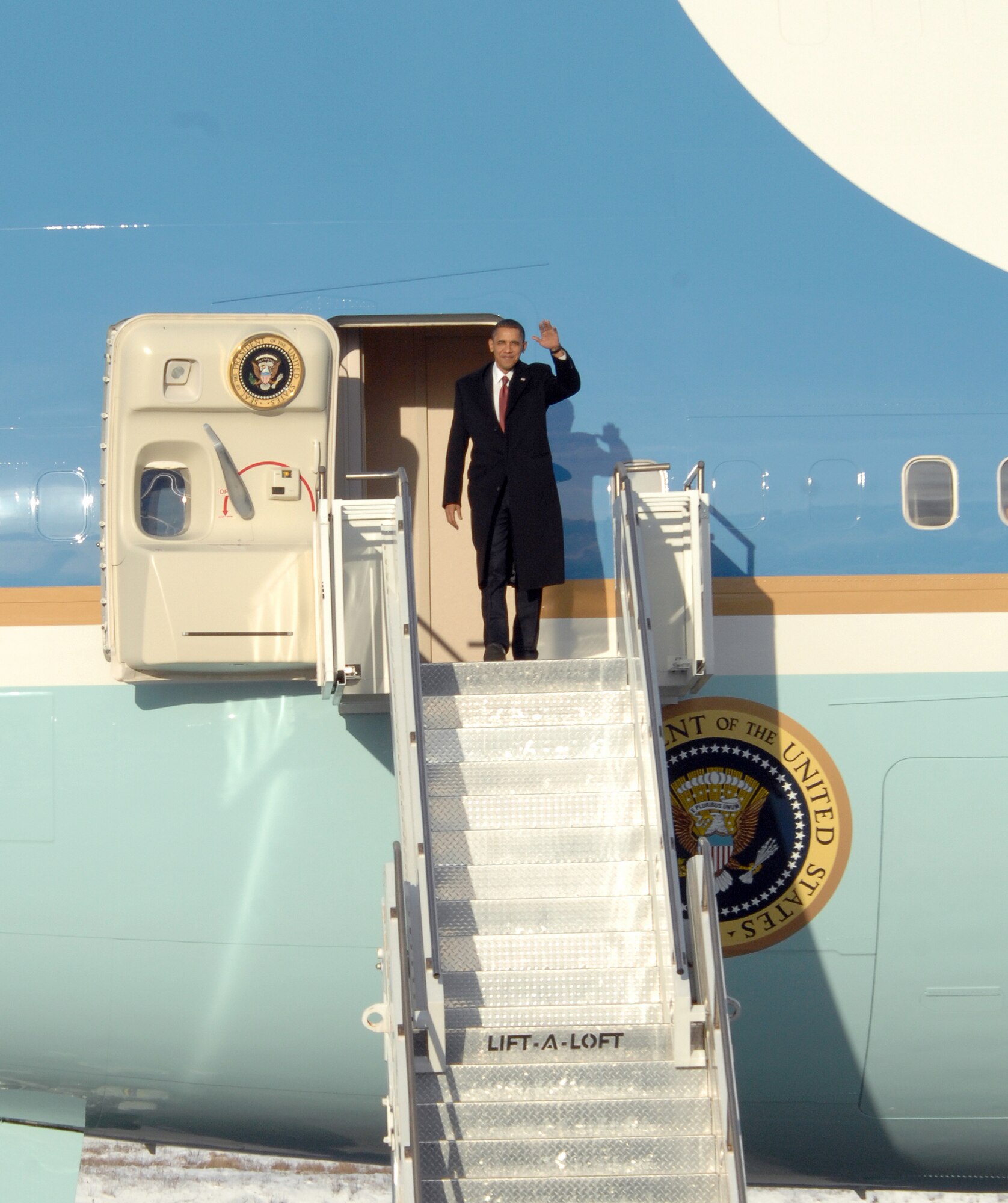 President Barack Obama departs Air Force One Nov. 12, 2009, at Elmendorf Air Force Base, Alaska. The president was at the base to meet with servicemembers and offer remarks to the local community.(U.S. Air Force photo/Senior Airman Matthew Coleman-Foster)