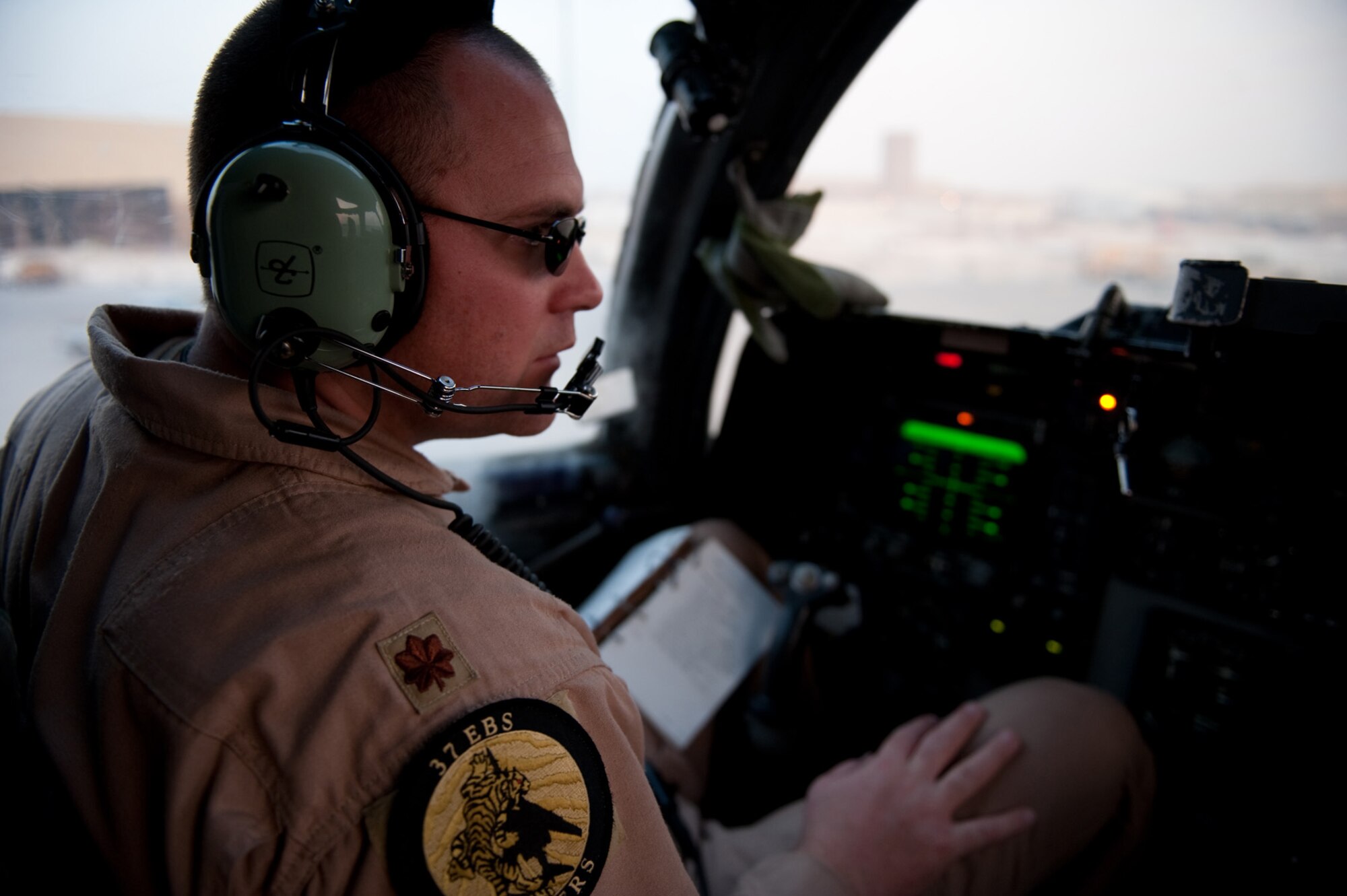 Maj. Andrew Kowalchuk, 37th Expeditionary Bomb Squadron pilot, performs preflight checks on a B-1B Lancer, Nov. 11, 2009, in Southwest Asia. Carrying the largest payload of both guided and unguided weapons in the Air Force inventory, the multi-mission B-1 is the backbone of America's long-range bomber force. Major Kowalchuk is deployed from Ellsworth Air Force Base, S.D., in support of operations Iraqi Freedom and Enduring Freedom. (U.S. Air Force photo/Staff Sgt. Robert Barney)