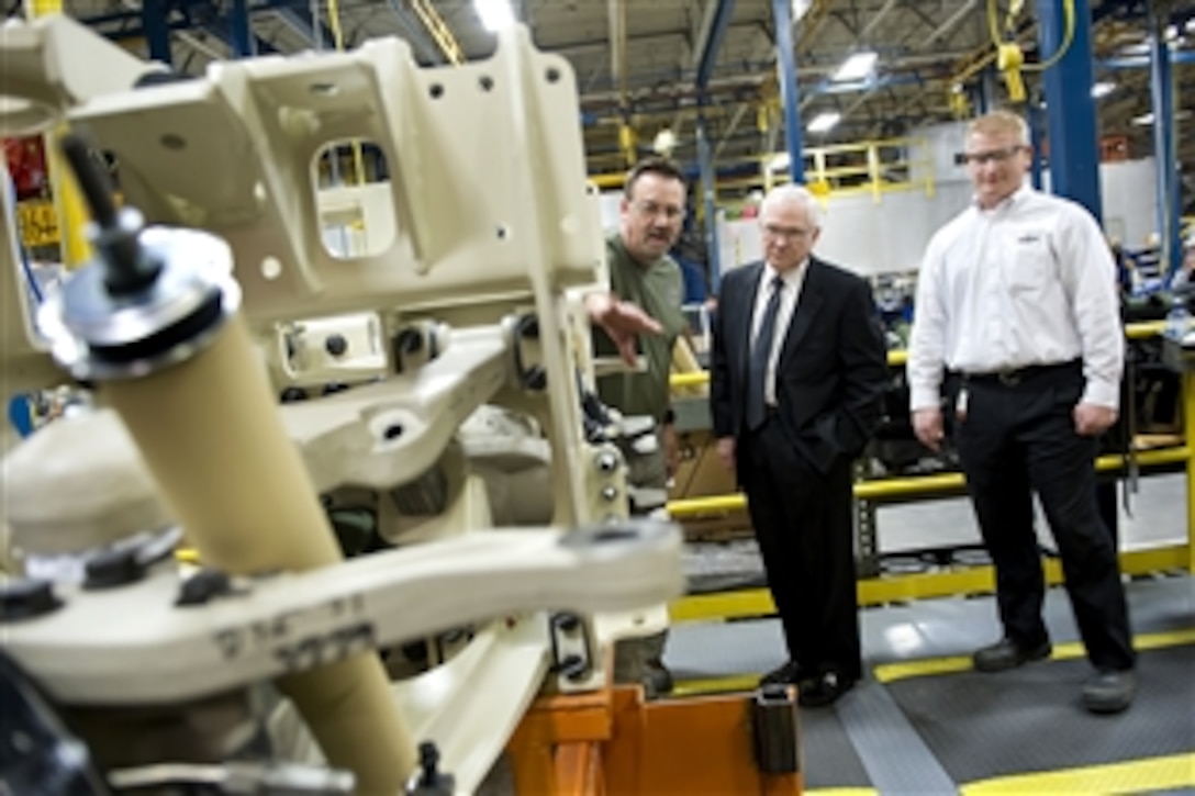 Defense Secretary Robert M. Gates tours the MRAP-All Terrain Vehicle production facility in Oshkosh, Wis., Nov. 12, 2009.  The design of the vehicle, known as an M-ATV, combines the protection warfighters have come to expect in MRAP vehicles with the extreme mobility and durability needed to negotiate mountainous off-road terrain.  