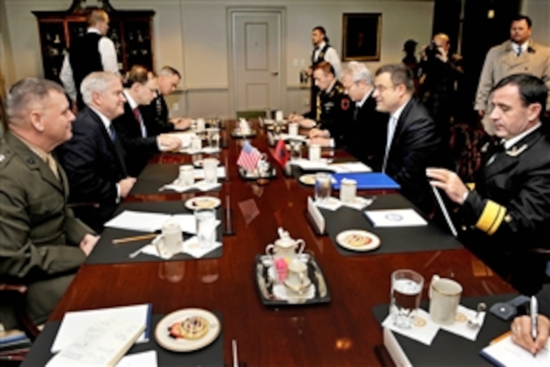 U.S. Defense Secretary Robert M. Gates, second from left, hosts a meeting with Albanian Defense Minister Arben Imami, second from right, at the Pentagon, Nov. 13, 2009. U.S. Marine Corps Gen. James Cartwright, left, vice chairman of the Joint Chiefs of Staff, joined Gates for the meeting.