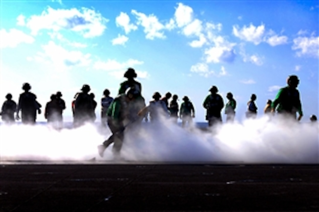 U.S. sailors conduct carrier qualifications aboard the aircraft carrier USS Dwight D. Eisenhower in the Atlantic Ocean, Nov. 5, 2009.