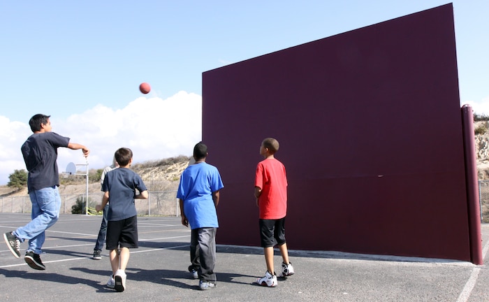 Eight grade students from San Onofre Elementary School, Camp Pendleton enjoy a game of "Wall Ball" during recess, Nov. 13. The wall was reconstructed after allegedly being burned down, by vandals, Sept. 21.